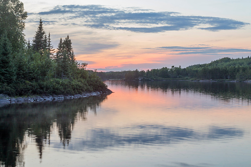 A Shot of Beautiful Sunset Reflections in a Calm Vern Lake in the Boundary Waters Canoe Area Wilderness of Northern Minnesota