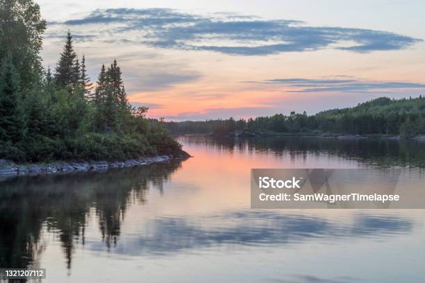 A Beautiful Summer Sunset Reflecting In Vern Lake In The Bwca Of Northern Minnesota Stock Photo - Download Image Now