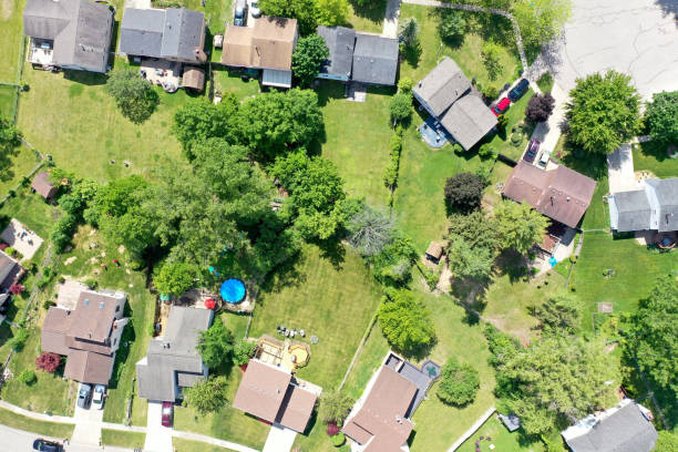 istock Homes and Yards in a Subdivision Aerial View 1321207997