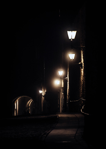 Foggy street in old town district. Tallinn, Estonia