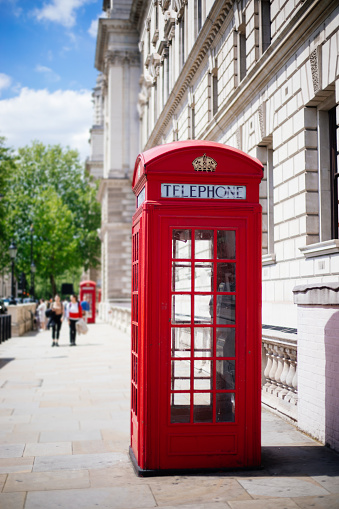 London telephone booth row. London landmarks - red phone booths.