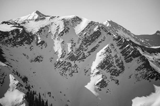 istock Snow Capped Mountains Black And White 1321213120