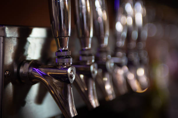 istock Row of Wine or Beer Taps 1321213383