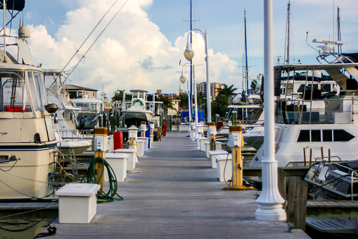 Boats Docked on a Long Pier in Clearwater Beach, Florida