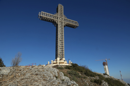Skopje, Macedonia - DECEMBER 23: Millennium Cross at Vodno Hill in Skopje on December 23, 2016 in Macedonia. Millennium Cross is a 66 meters tall cross situated on the top of the Vodno Mountain.
