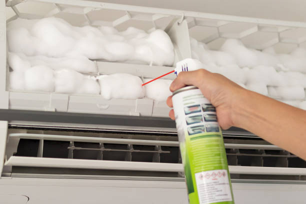 istock air conditioner cleaning with spray foam cleaner 1321220560