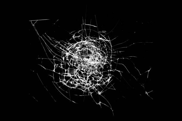 istock broken glass is insulated against a black background. white cracks 1321223689