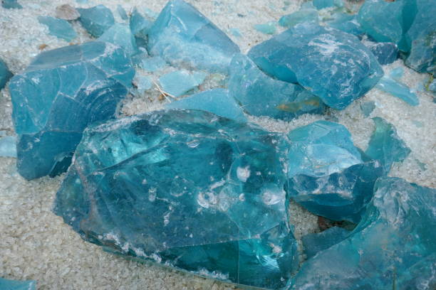 istock Beautiful pieces of broken blue glass 1321228111