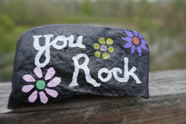 istock Kindness rock with you rock encouraging message painted close-up 1321228242