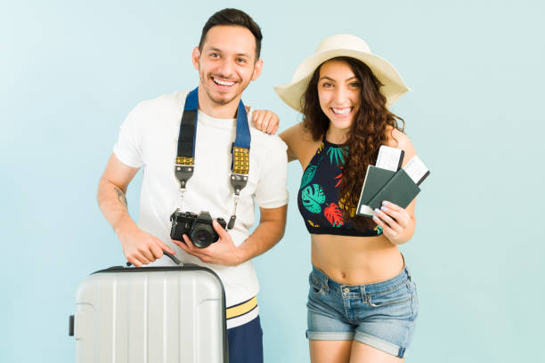 istock Happy couple ready for their beach vacations 1321229148