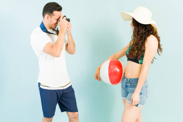 istock Tourists visiting a tropical beach during the summer 1321229150