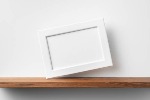 istock horizontal white wood photo on bookshelf and wall 1321230935