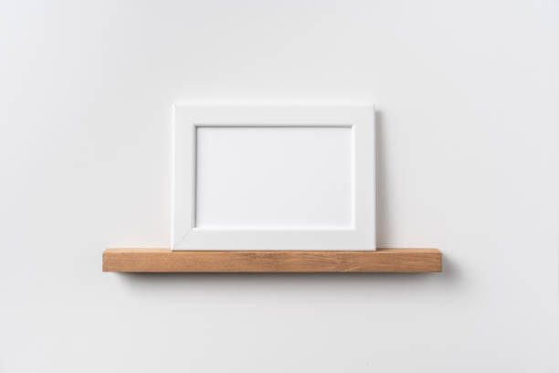 istock horizontal white wood photo on bookshelf 1321231711