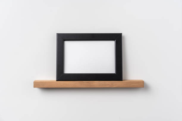 istock horizontal black wood photo on bookshelf 1321231768