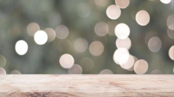 istock Wooden shelf over blur bokeh light background. 1321233574