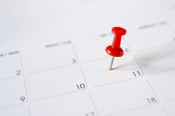 istock Calendar with red pin on the 11th. 1321236478