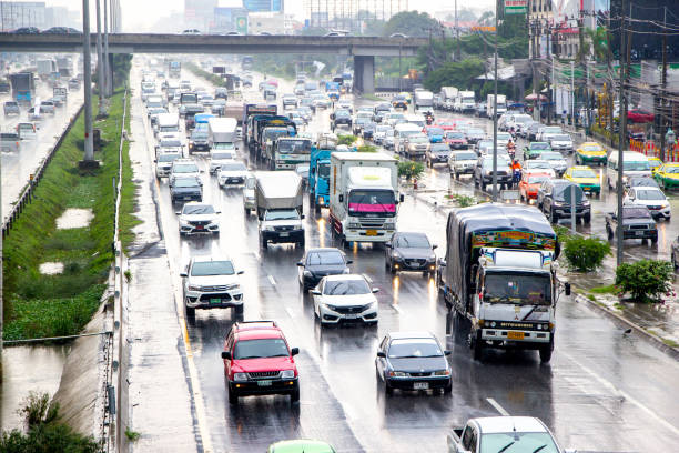 istock Traffic jams on road while raining in the morning 1321238331
