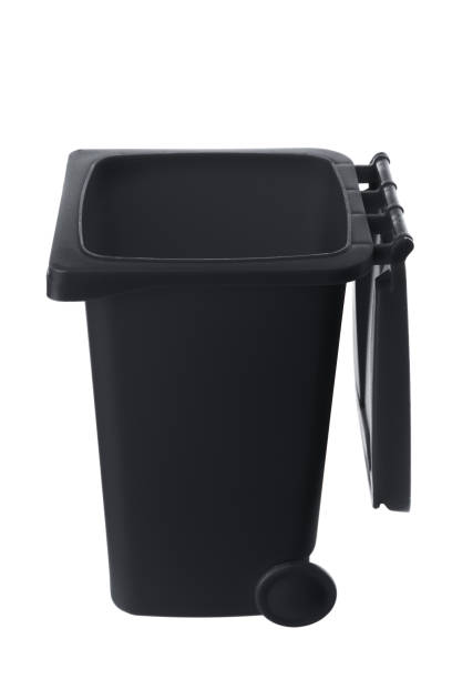 istock Plastic black trash can isolated on white background 1321240756