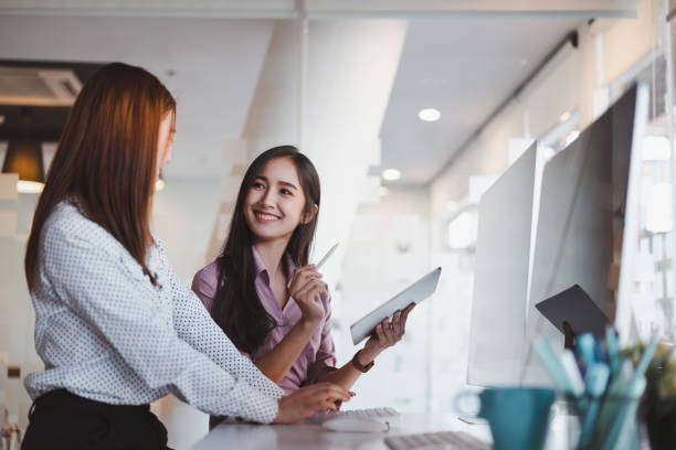 istock Startup young business colleagues discussing work together on tablet. Coworker collaboration concept 1321240820
