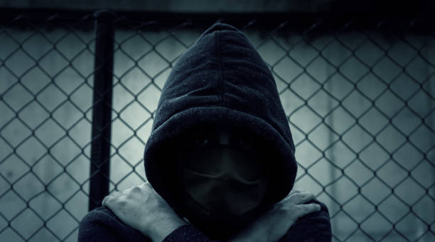 istock Young street gang with mask 1321251795