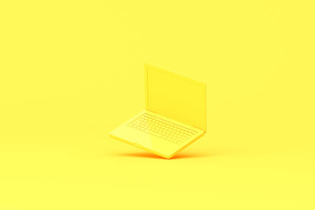 istock 3d rendering of laptop on yellow background. Minimal mockup idea. 1321253761