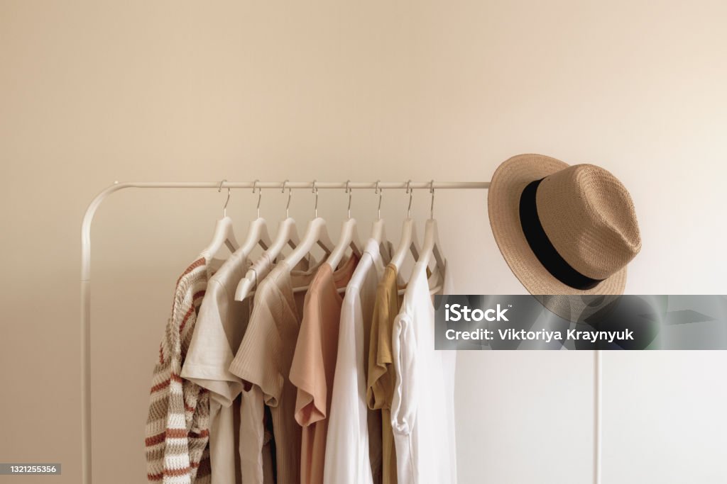 Rack with stylish women's summer clothes. Concept for shopping store, beauty, fashion Rack with stylish women's summer clothes. Concept for shopping store, beauty, fashion. Fashion Stock Photo