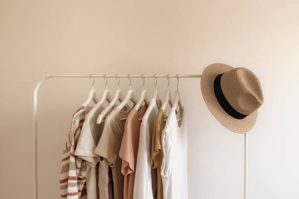 rack with stylish women's summer clothes. concept for shopping store, beauty, fashion - moda imagens e fotografias de stock