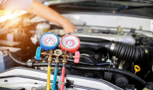 istock Car air conditioner check service, leak detection, fill refrigerant. 1321257393