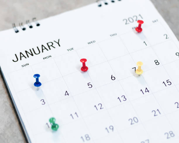 istock Calendar and scheduled appointments with pins. 1321257603