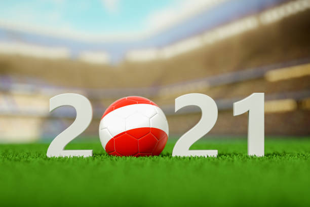 istock 2021, Austria Soccer Ball on a grass field 1321258271