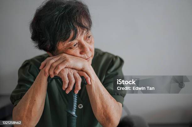 Sad Asian Chinese Senior Woman At Home Portrait Stock Photo - Download Image Now - Senior Adult, Depression - Sadness, Sadness