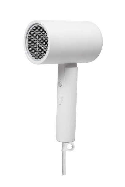 istock Modern hair dryer with nozzle isolated on white. 1321262975