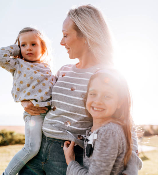 istock mother carrying the family 1321263564
