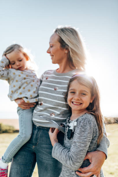 istock mother carrying the family 1321264172
