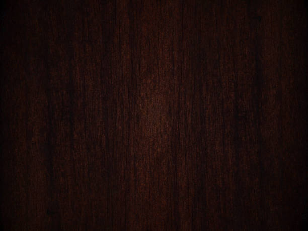 istock Close up dark brown wood texture background 1321266042