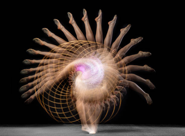 Young girl rhythmic gymnast in motion and action isolated in mixed light on dark background. Stroboscope effect. Young sportive girl, rhythmic gymnast in action and motion isolated over dark background in mixed neon light. Concept of action, motion, sport life, competition. Copy space for ad. temporal aliasing stock pictures, royalty-free photos & images