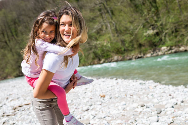 istock Mother and daughter enjoying road trip 1321273253