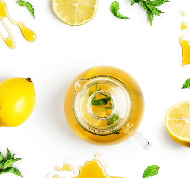istock Hot lemon. Teapot with mint, lemon, honey and tea ingredients 1321273332