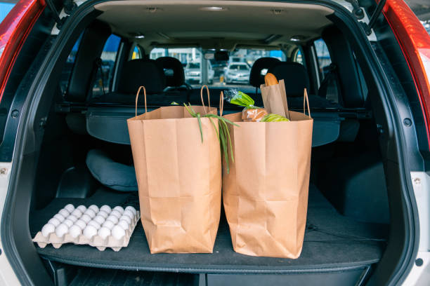 istock bags with products in car trunk 1321274314