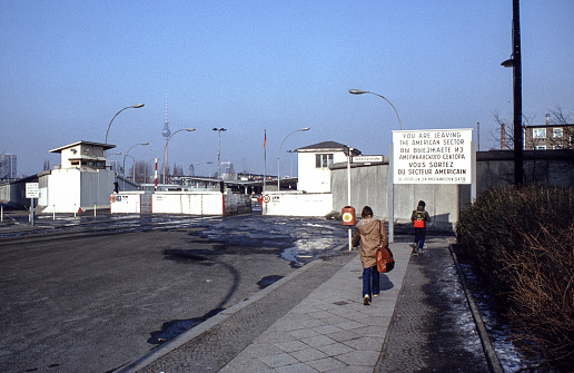 Berlin, Germany, January 21, 1983 - Historical photo of the border crossing Berlin Heinrich-Heine-Straße from 1983 seen from the west side, in the background the Berlin TV tower