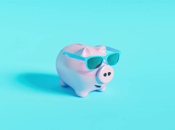 istock minimal piggy bank with sunglasses 1321275766