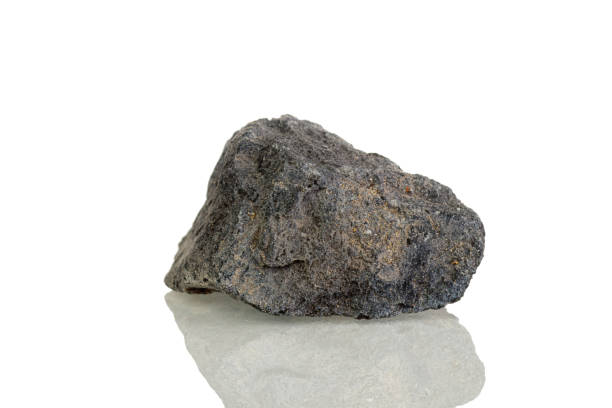 istock macro mineral stone Serpentine on a white background 1321284084
