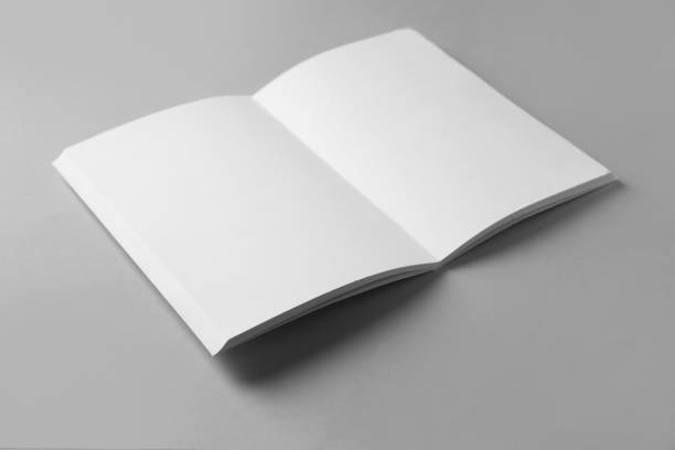 istock Open blank brochure on grey background. Mockup for design 1321286551