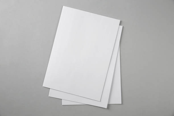 istock Blank brochures on grey background, top view. Mockup for design 1321286871