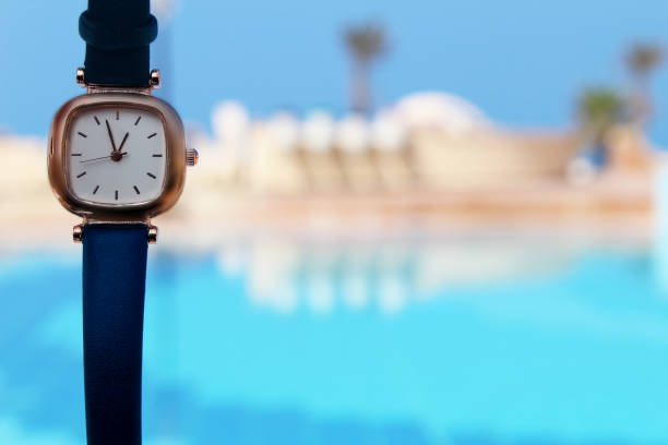 Close-up of Clock over swimming pool, Egypt 2020