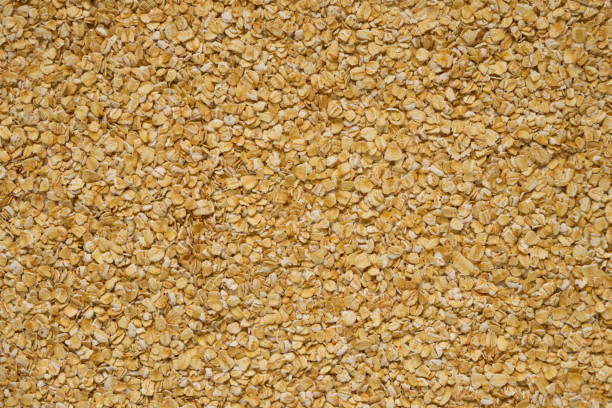 istock Large background of raw oatmeal for text overlay 1321294779