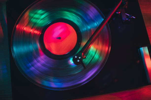 istock Turntable play vinyl record with light show effects 1321296230