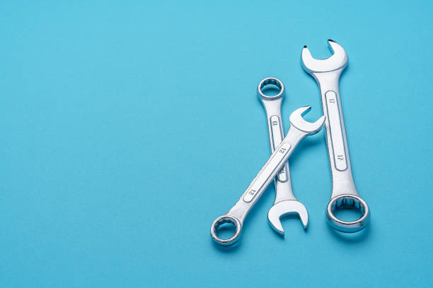 istock Set of spanners and wrenches on color background 1321297838
