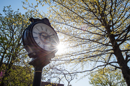 Doylestown, USA - April 24, 2021. Historic clock in downtown Doylestown, Bucks County, Pennsylvania, USA.