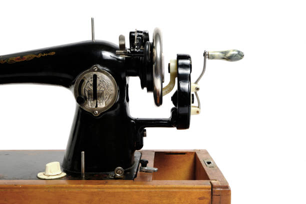 istock Old, retro vintage sewing machine on a white background. 1321298045